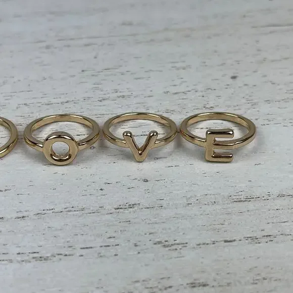 💕 NWOT Gold Tone L O V E Midi Ring Set Size 3 - 3.5 LOVE Stacking Rings - Picture 7 of 14